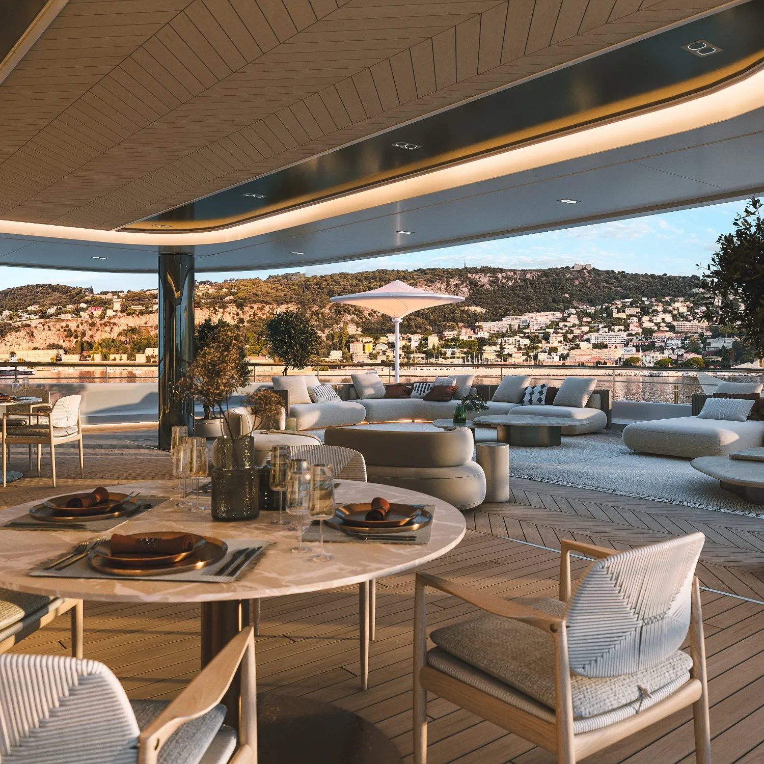 Photo of a table on the deck with sofas in the background